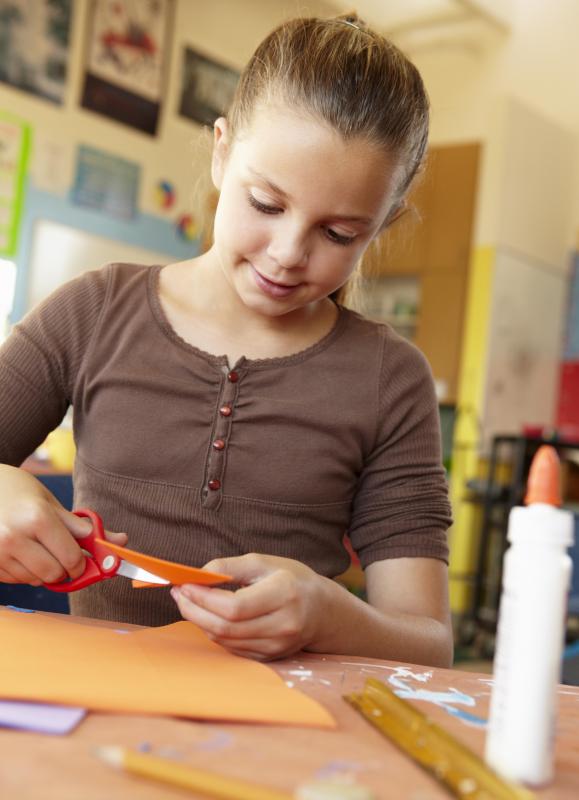Stick puppets are simply colored, cut out, and glued to a craft stick.