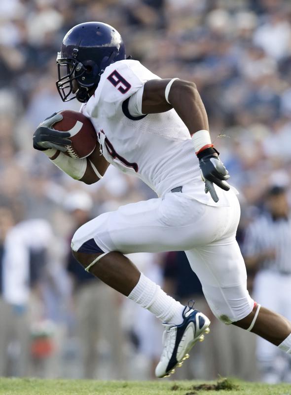 Football players often wear bicep bands to help absorb sweat.