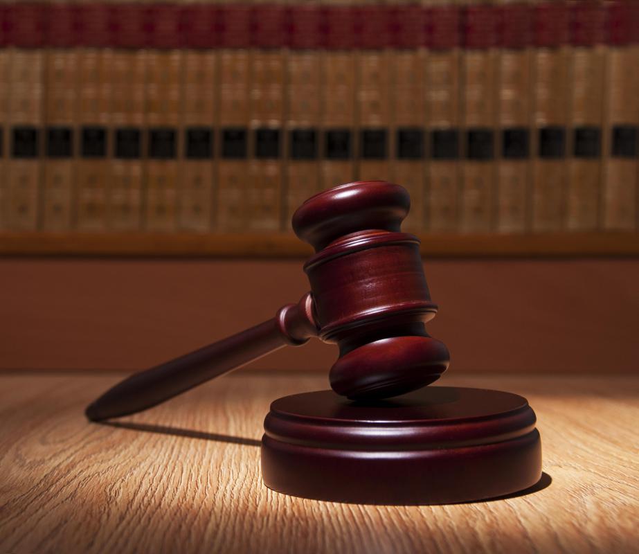 A judge may utilize a gavel in a courtroom.