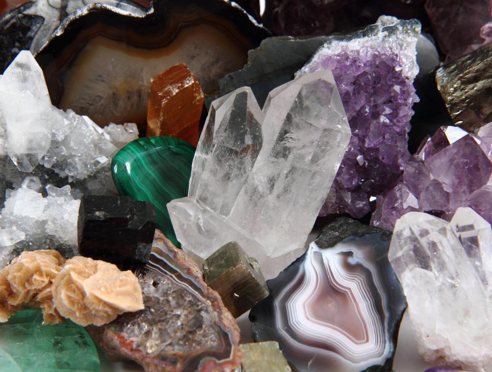 A branch of earth science that is concerned with the physical and chemical properties of minerals is referred to as mineralogy.