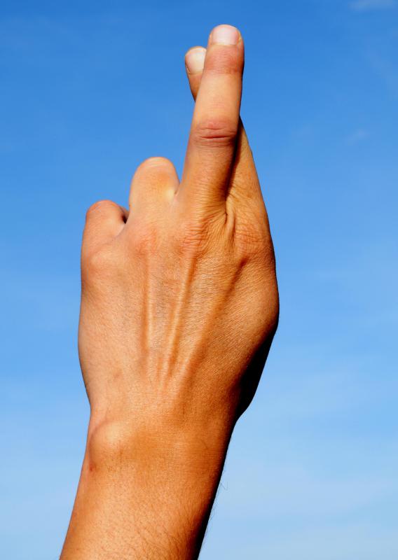 Crossed fingers are a nonverbal way of communicating a wish for good luck or hopefulness.