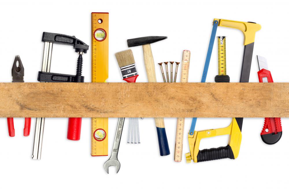 Common hand tools to have around the house are pliers, hand saws, levels, paint brushes and wrenches.