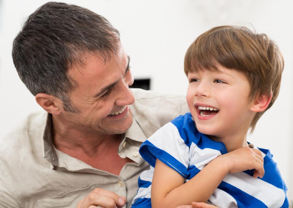 A father who shows love and affection to his children is enabling them in a positive way.