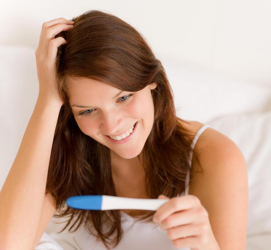 Tracking her basal body temperature helps a woman determine the best time to attempt pregnancy.