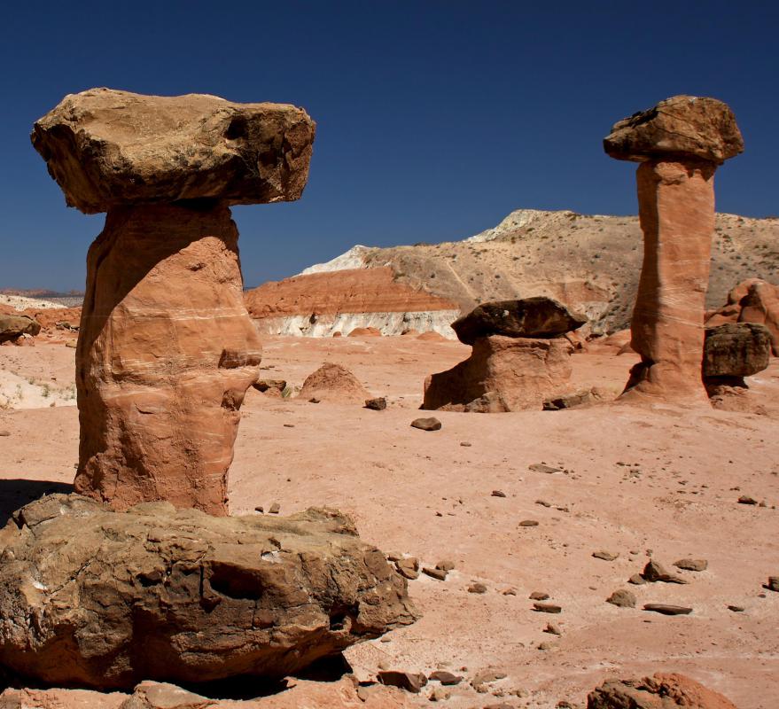 "Hoodoo" is also a name for a tall, somewhat cylindrical desert rock formation.