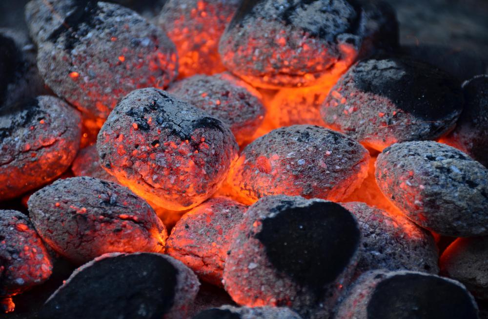 Hot charcoal briquettes.