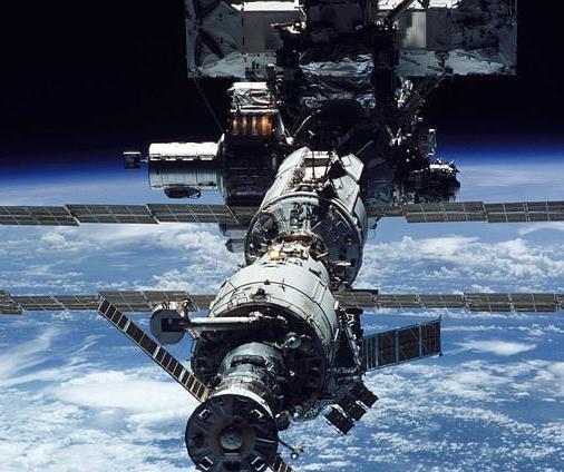 The International Space Station operates between 320 km and 347 km above Earth's surface.