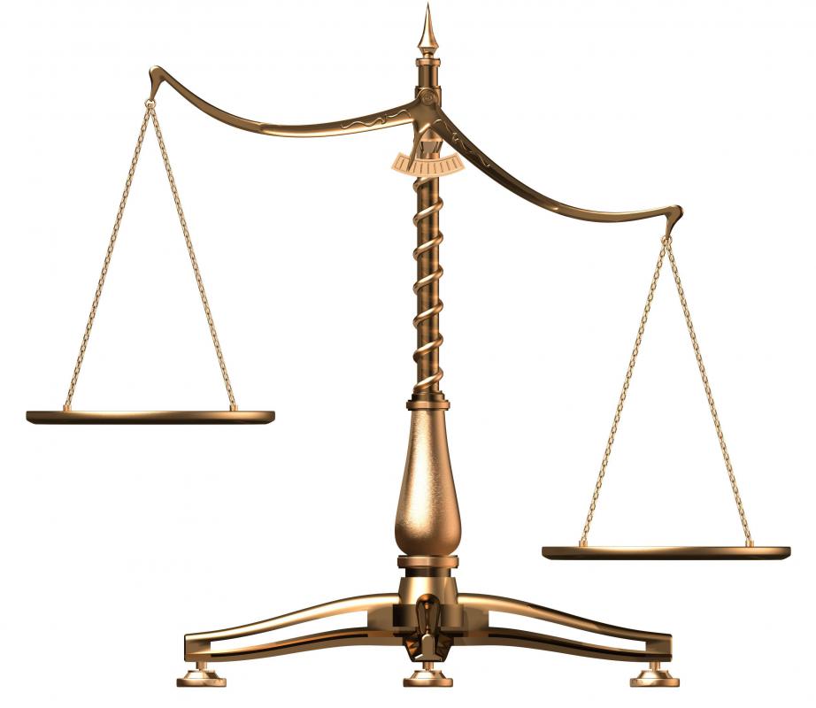 A beam scale is often used to represent the scales of justice.
