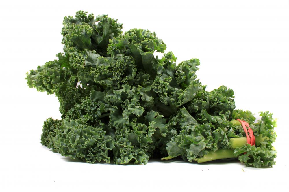 A person with a vitamin D deficiency may want to eat a salad filled with kale.