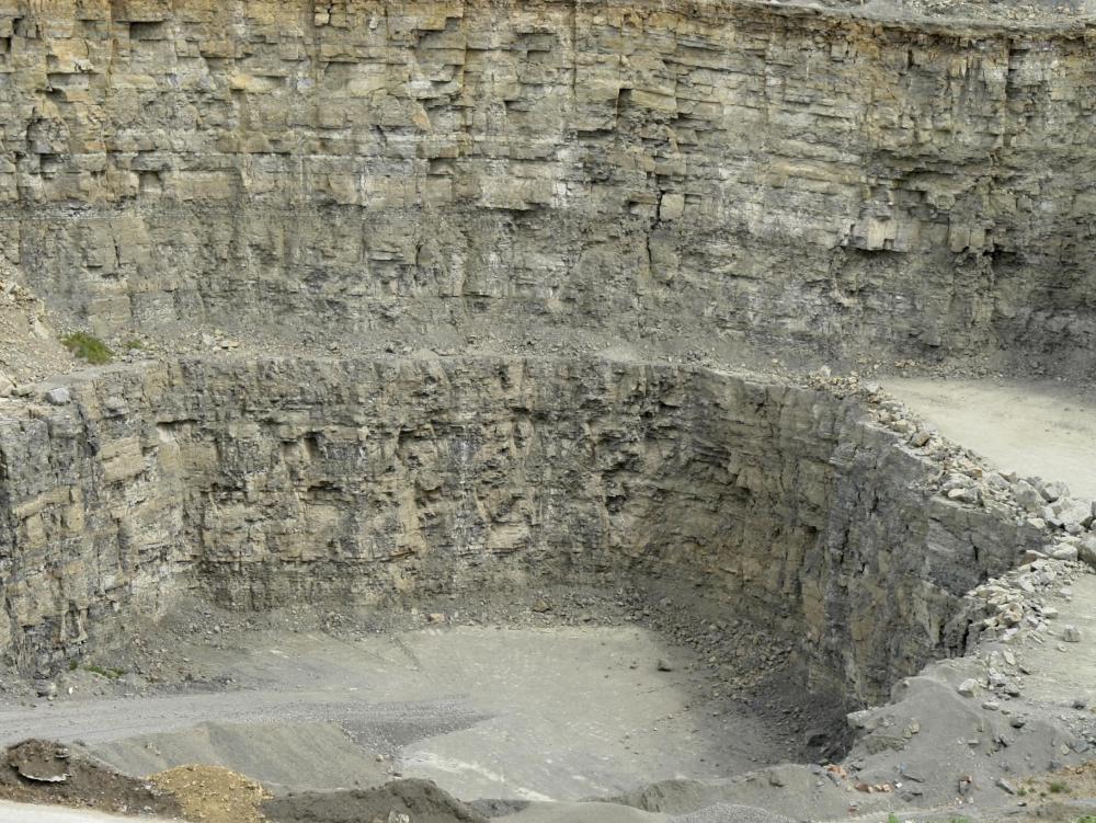 Natural limestone is primarily made of calcite and aragonite, but dolomite will form in the stone when the calcium ions are replaced by magnesium ions.
