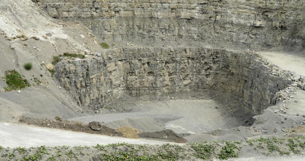 Limestone is quarried from the ground.
