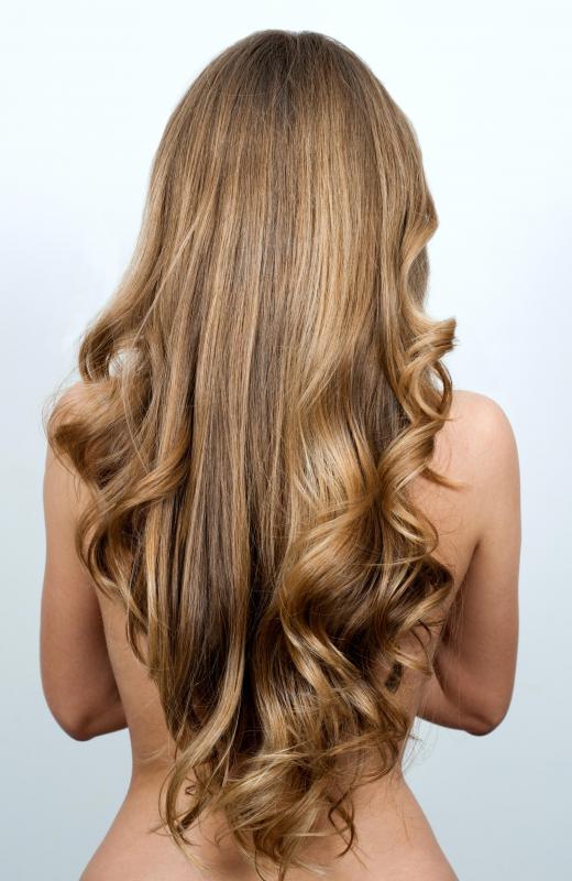 A horn comb may help maintain healthy hair better than plastic combs.