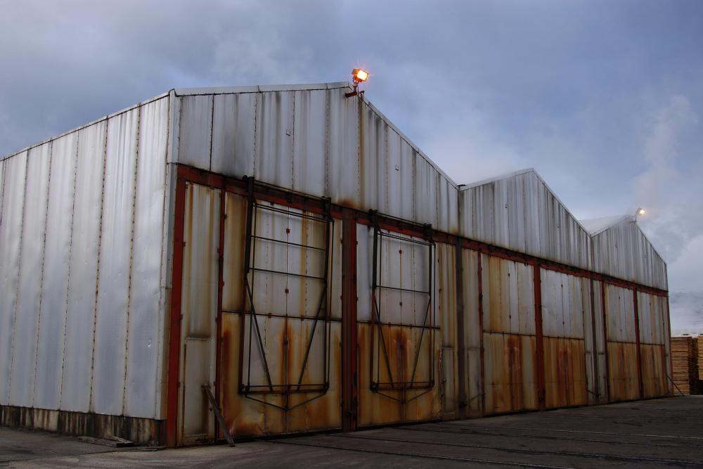 Lumber at a sawmill can dry in the open or more rapidly in a kiln.