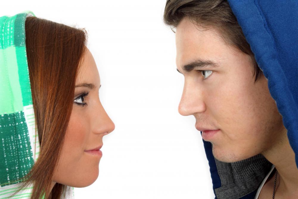 A staring contest is a form of mad-dogging.