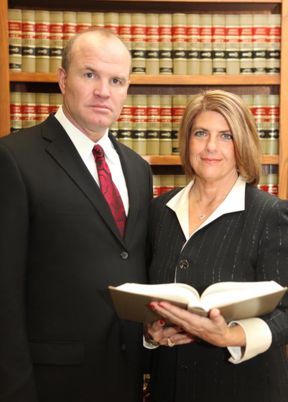 Often a lawyer, an executor is a legal title for a person who administers a will.