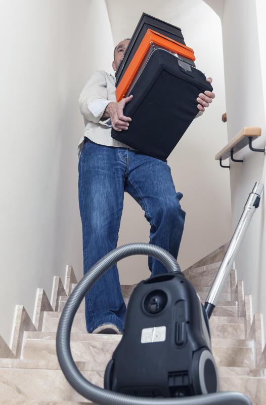 Muscle spasms in the back might be caused by heavy lifting.