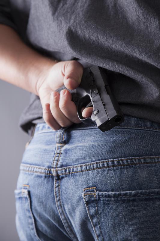 Carrying a concealed weapon is usually illegal unless someone has a proper license.