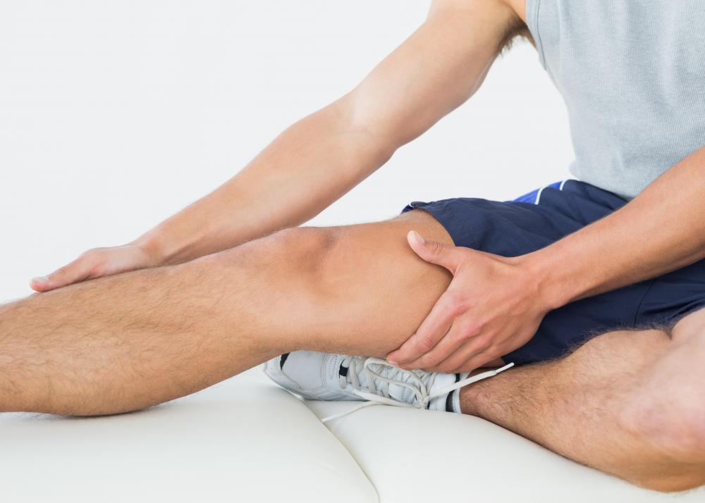 When people overexert their physiologies, their bodies produce excess acids that accumulate in the muscles, which causes them to feel sore.