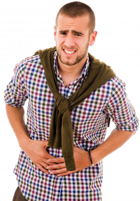 Signs of an allergic reaction to pineapple may include abdominal cramps.