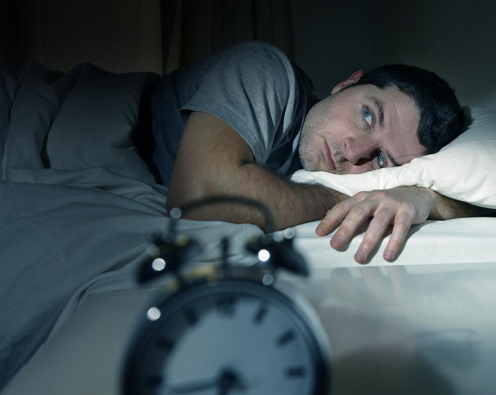 A common symptom of caffeine intoxication is restlessness and insomnia.