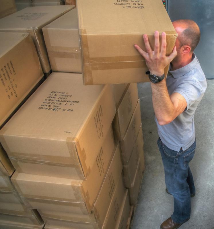 A warehouse worker performs shipping, receiving, and packaging duties.