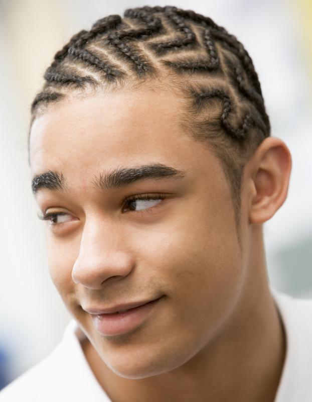 A man with cornrow braids.