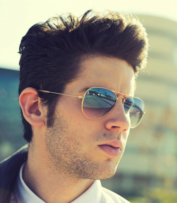 Polarized sunglasses are designed to reduce glare from light that is reflected off of surfaces like water or snow.