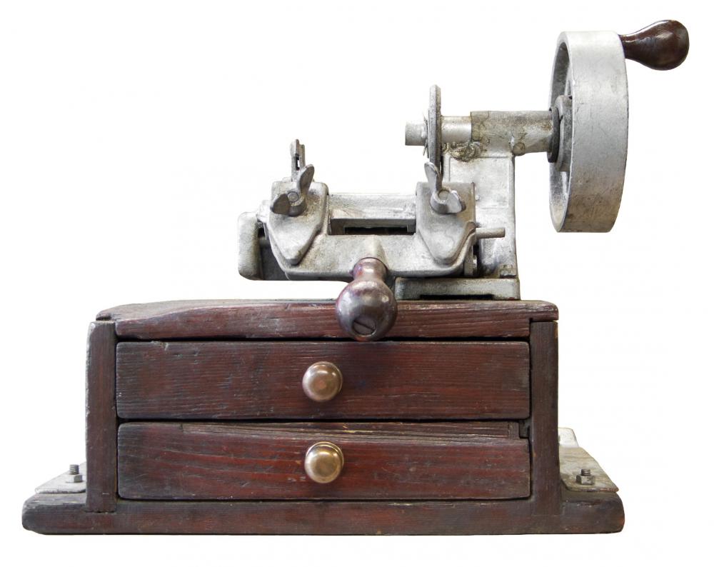 Key-cutting machines use the process of die cutting.