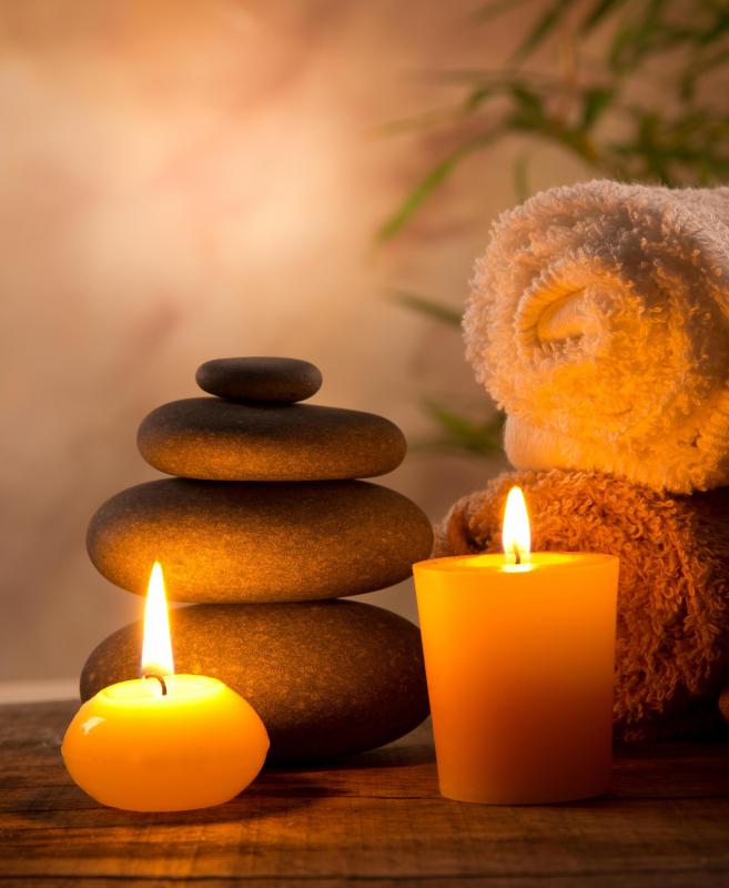 A couples massage may include hot stone treatments.