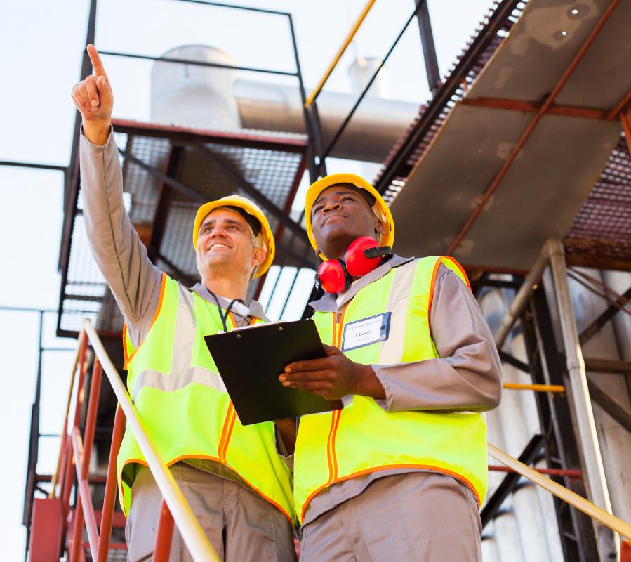 Industrial workers at job site.