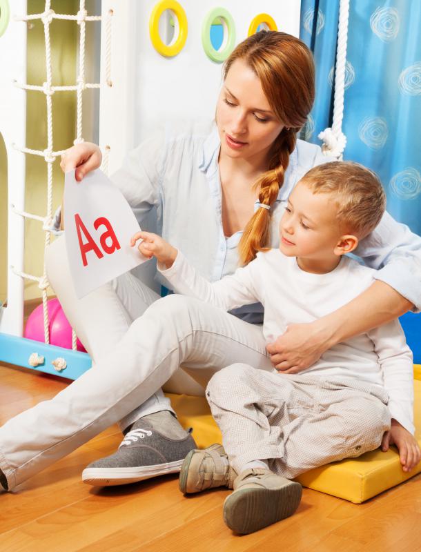 Young children commonly learn the alphabet through rote learning, which uses repetition to teach new concepts.