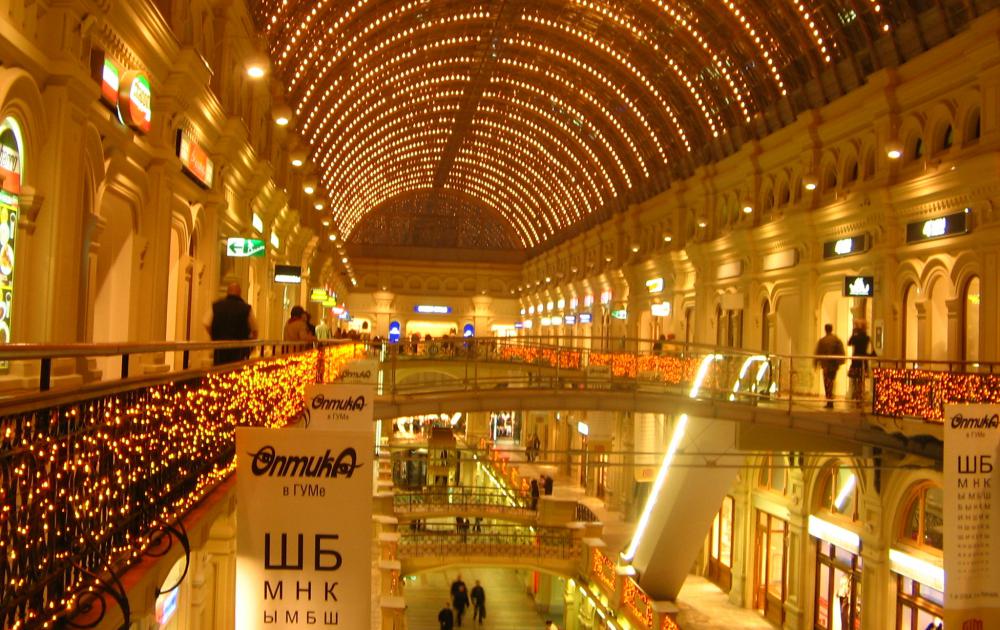 Malls, shopping centers, and other marketplaces are seen as positive institutions under free market economic theories because they allow citizens to influence the direction of the economy.