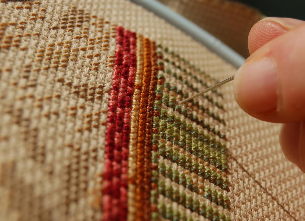 Needlepoint traditionally features the tent stitch.