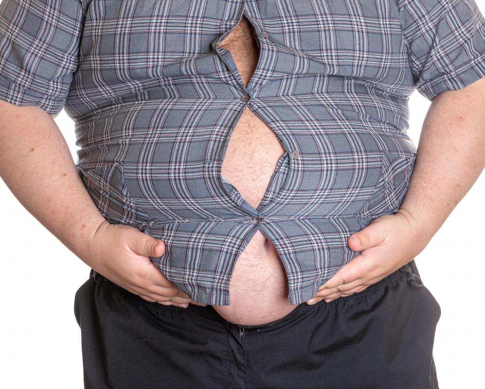 Signs of glomerulonephritis may include swelling of the abdomen.