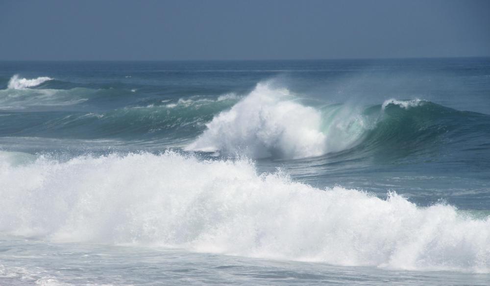 Waves tumble and wear down debris in the ocean.