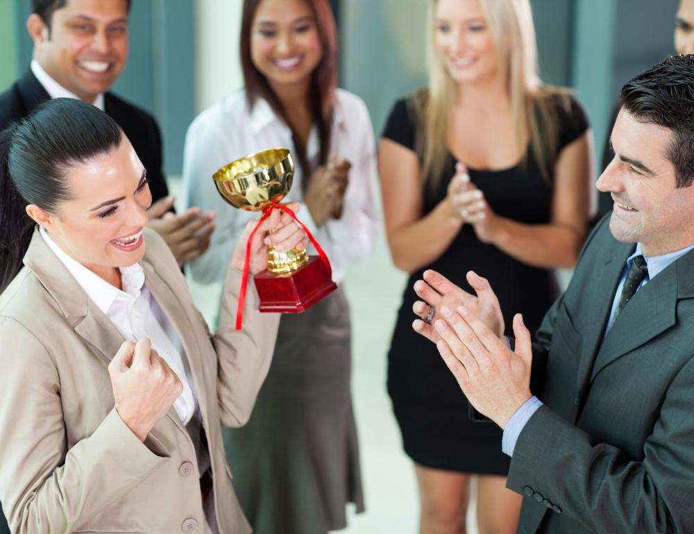 An office might honor good work at an award ceremony.