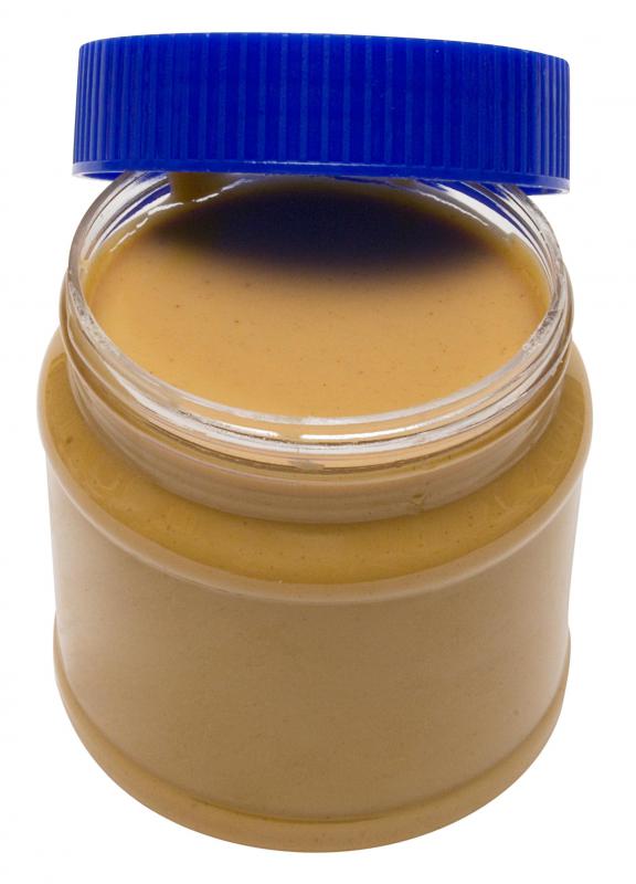 Monoglyceride acts as an emulsifier in processed peanut butter to keep the oil from separating and rising to the top.