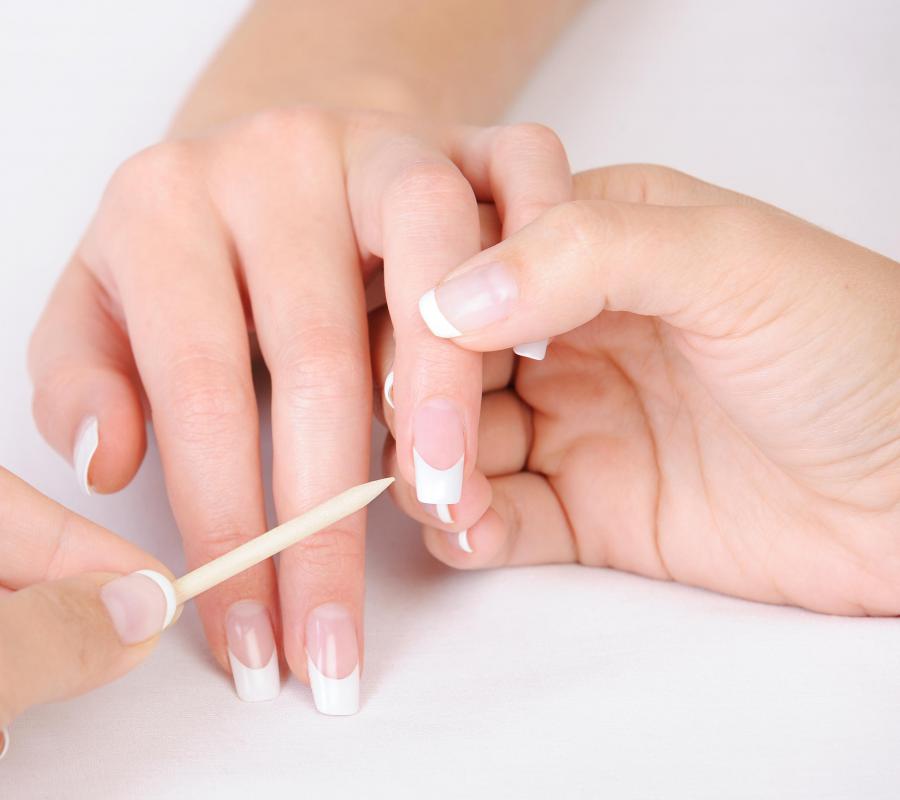 Cuticles need to be pushed back before a gel manicure is applied.