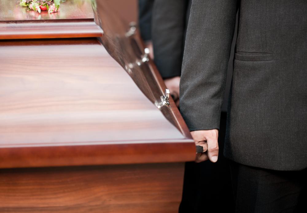 During a funeral pallbearers are assigned to carry the coffin.