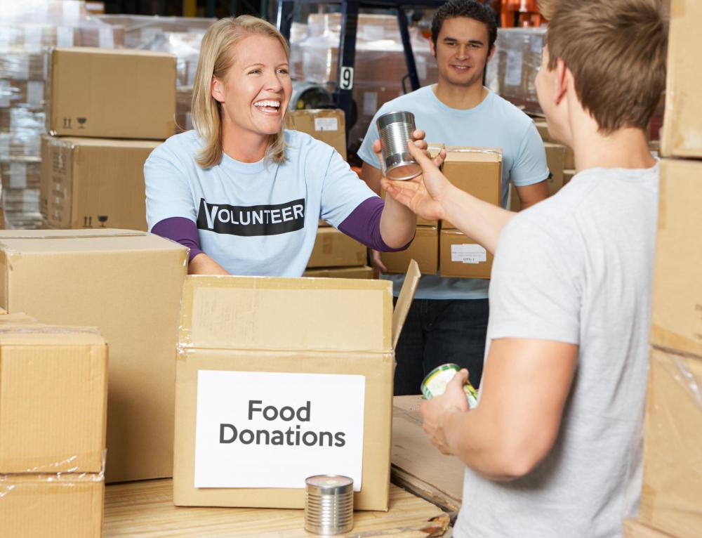 Community service may involve collecting canned goods for the local food pantry.