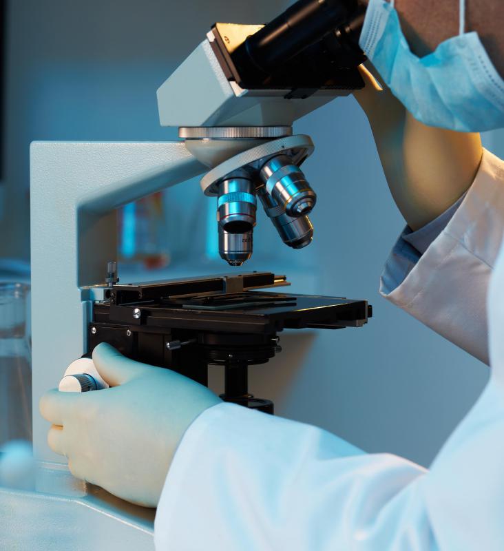A dermatologist may examine a scraping of skin under a microscope to diagnose parakeratosis.