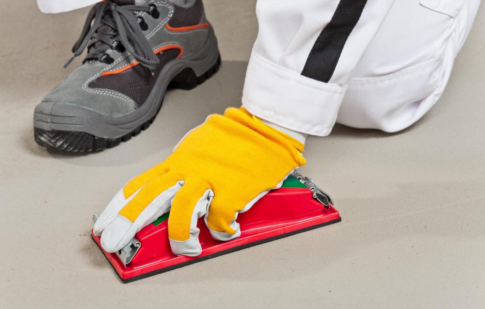 Some garage floors require hours of preparation before floor epoxy can be applied.