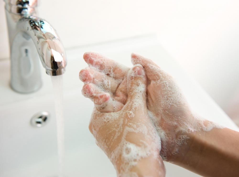 A chemical burn should be washed thoroughly with cold water.