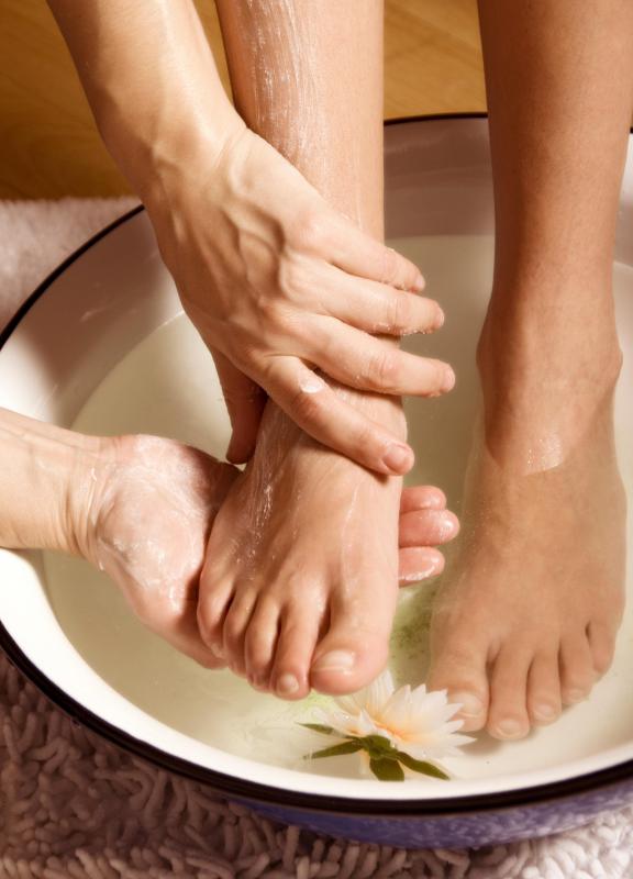 Immersing a foot in warm water containing salt may help treat ingrown toenails.