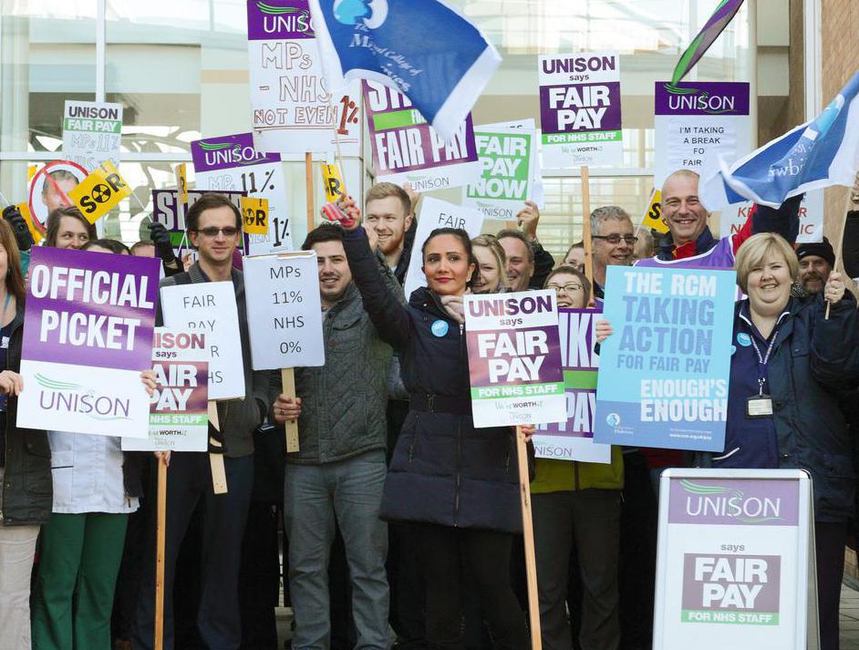 A scab breaks a strike by crossing a picket line.