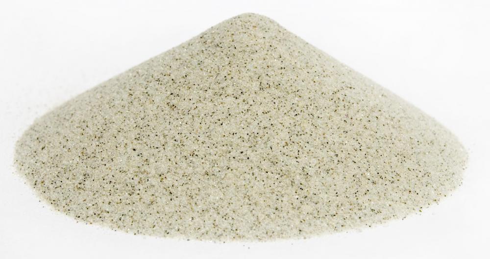 Sand is composed of silicon dioxide, which is extracted to produce the synthetic material commonly used to make semiconductor devices.