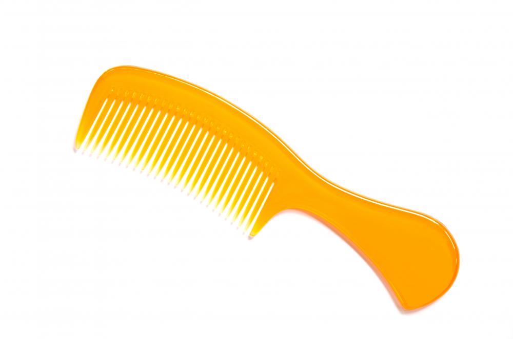 Plastic combs are the most popular but can tear out hair as they are being used.