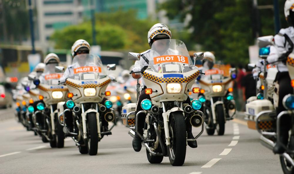 Three-quarter shell helmets are commonly worn by police who ride motorcycles.