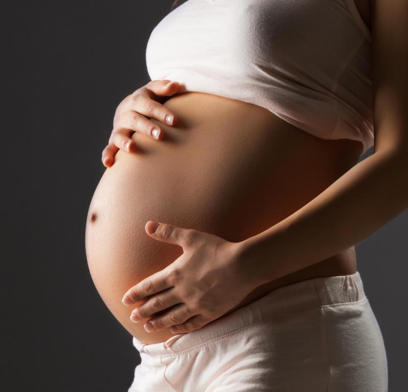 Stretch marks commonly occur in the third trimester of pregnancy.