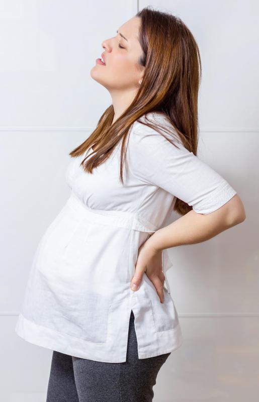Pregnant women sometimes get chiropractic treatment to help alleviate their back pain.